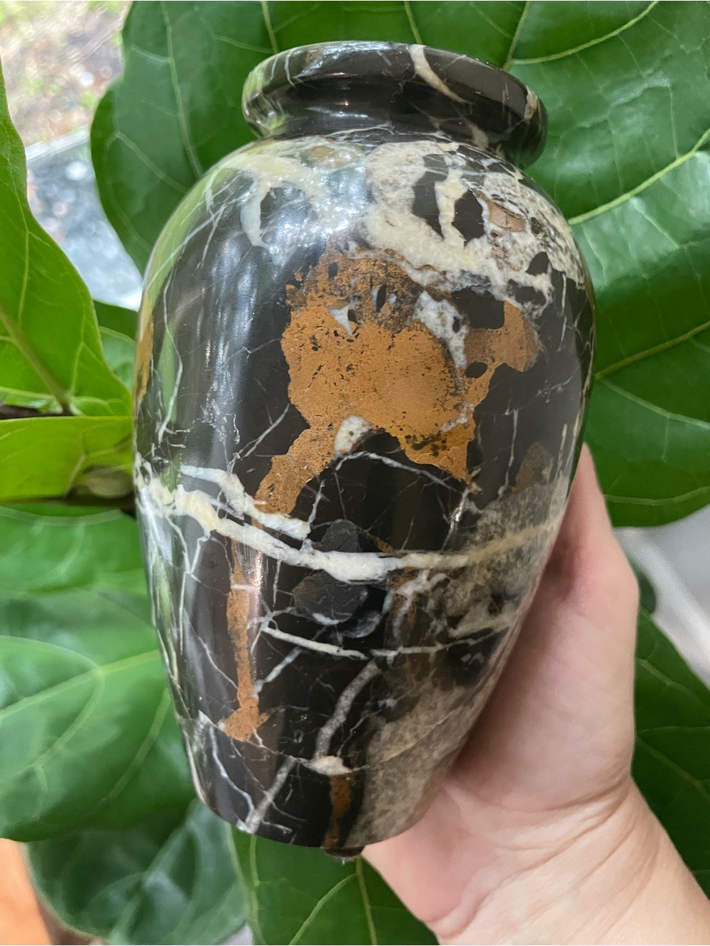 Black marble vase. One solid carved piece of marble